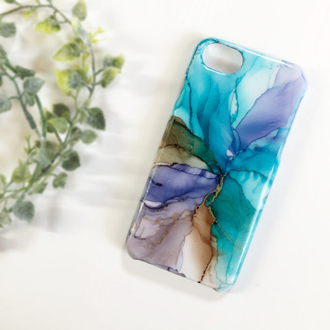 ブルーのアルコールインクアートスマホケース
